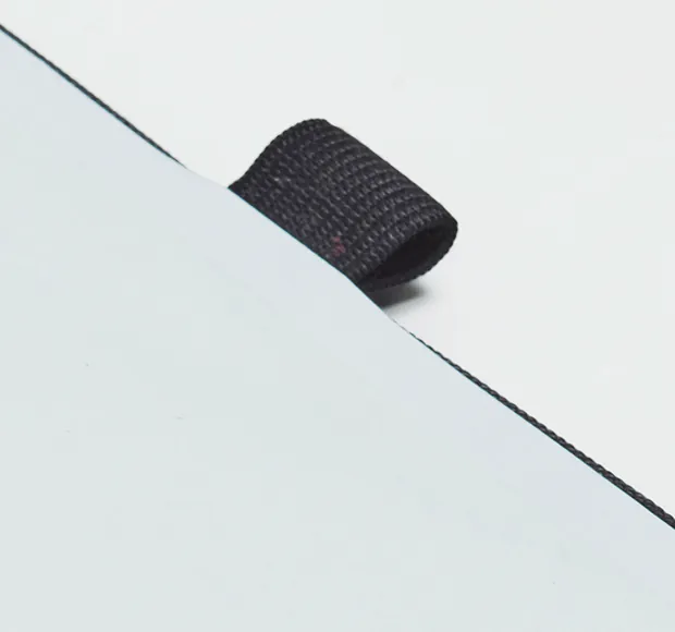 Elastic pen loop on the edge of the planner